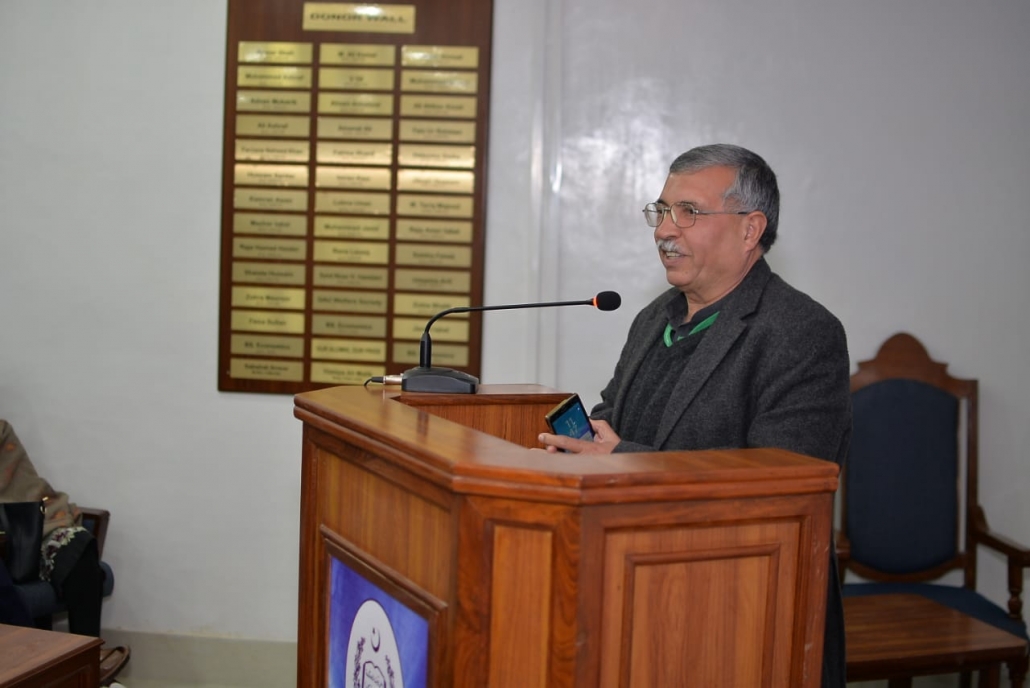 Prof. Shah at the podium